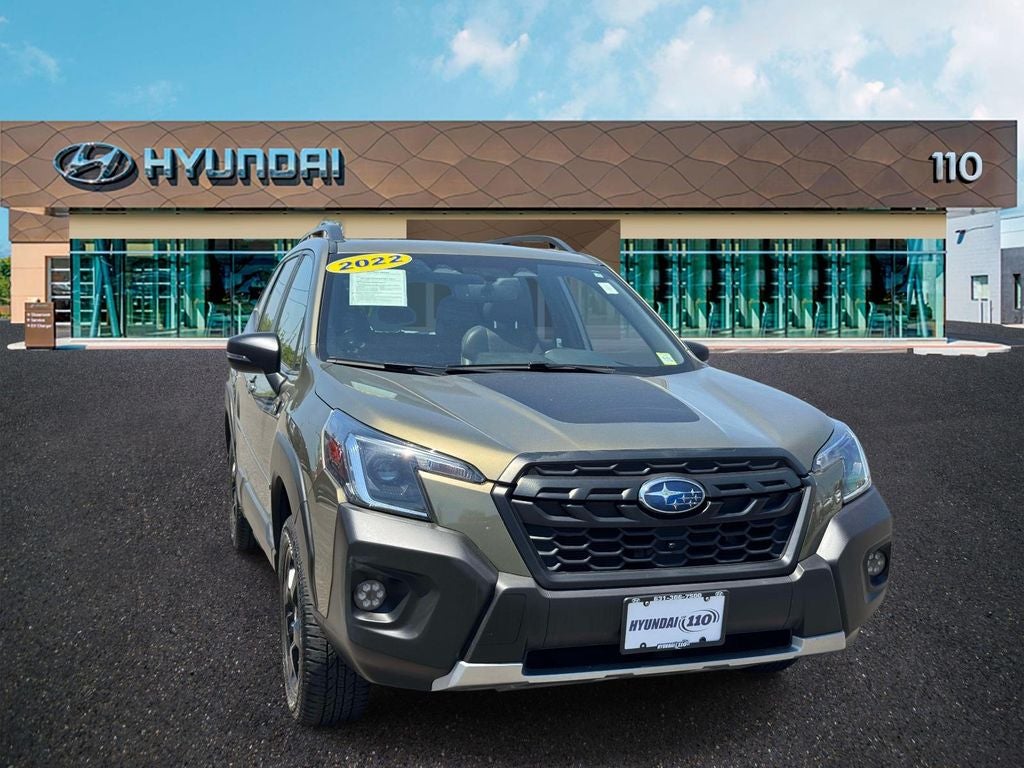 2023 Subaru Forester Wilderness in Autumn Green Metallic — front three-quarter view