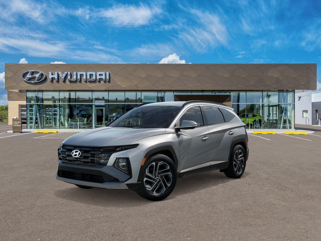 2026 Hyundai TUCSON SEL Plus AWD in Shimmering Silver — front three-quarter view